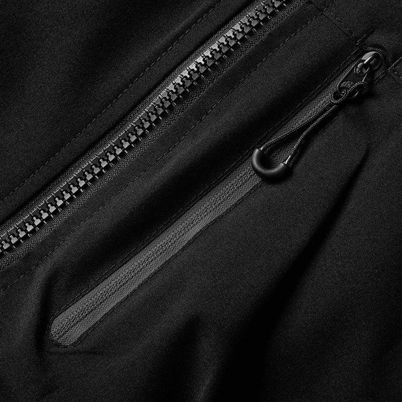 Macro zip poche latérale veste noire — curseur noir, coutures et finition soignés