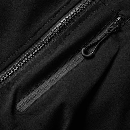 Macro zip poche latérale veste noire — curseur noir, coutures et finition soignés