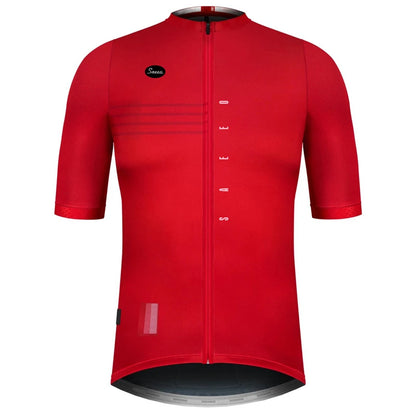 Maillot cyclisme homme coloris rouge vif uni avec panneaux résille latéraux sur les manches