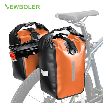 Logo Newboler et paire de sacoches orange et noir, l'une montée sur porte-bagage et roue, l'autre détachée montrant ses crochets de fixation