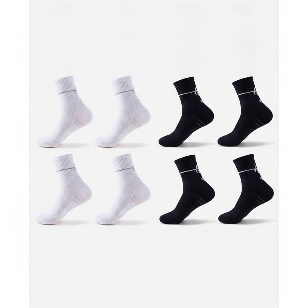 Studio : dix chaussettes alignées, cinq blanches et cinq noires, lot 5 blanc + 5 noir