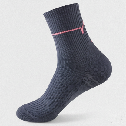 Studio : une chaussette gris foncé seule, vue de profil